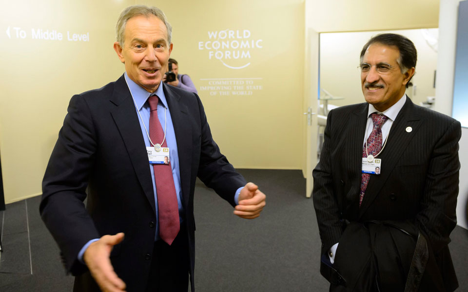 former-british-prime-minister-tony-blair-l-speaks-with-sheikh-abdullah-bin-mohammed-al-thani-r-chairman-of-ooredoo-of-quatar