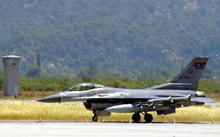 A Turkish F-16 fighter plane prepares to takeoff from the tarmac of a military airbase near the southwestern city of Mugla, May 23, 2006. Greek and Turkish fighter planes collided in mid-air on Tuesday while shadowing each other in the southern Aegean, where the two NATO allies have long disputed control over airspace. BEST QUALITY AVAILABLE FOR EDITORIAL USE ONLY TURKEY OUT REUTERS/Anatolian News Agency