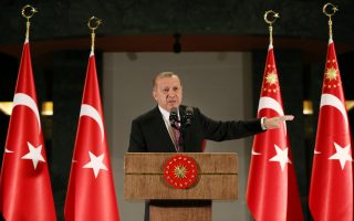 Turkish President Tayyip Erdogan makes a speech during a fast-breaking iftar dinner at the Presidential Palace in Ankara, Turkey, June 20, 2017. Picture taken June 20, 2017. Yasin Bulbul/Presidential Palace/Handout via REUTERS ATTENTION EDITORS - THIS PICTURE WAS PROVIDED BY A THIRD PARTY. NO RESALES. NO ARCHIVE.