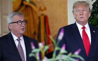 President Donald Trump, right, and European Commission president Jean-Claude Juncker arrive to speak in the Rose Garden of the White House, Wednesday, July 25, 2018, in Washington.(AP Photo/Alex Brandon)