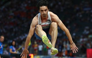 epa06946489 Dimitrios Tsiamis of Greece competes in the men's Triple Jump final at the Athletics 2018 European Championships in Berlin, Germany, 12 August 2018.  EPA/HAYOUNG JEON
