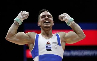 Eleftherios Petrounias of Greece after winning the gold medal in the rings during the men's artistic gymnastics finals at the European Championships in Glasgow, Scotland, Sunday, Aug. 12, 2018. (AP Photo/Darko Bandic)