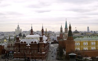 The domed roof of the Kremlin is seen on the right, in this view of Moscow's city center, Russia, on Thursday, Dec. 6, 2007. Economic expansion is boosting wages, cutting unemployment and prompting 