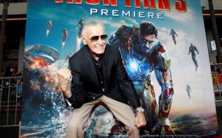 FILE PHOTO: Stan Lee gestures as he poses at the premiere of 