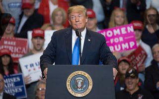 epa06924748 US President Donald J. Trump speaks during a rally at the Mohegan Sun Arena in Wilkes-Barre, Pennsylvania, USA, 02 August 2018. This marks Donald Trump's 22nd rally in Pennsylvania and is part of the lead-up to midterm elections this fall.  EPA/TRACIE VAN AUKEN