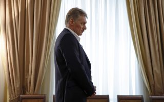 President Vladimir Putin's spokesman Dmitry Peskov speaks with The Associated Press in Moscow, Russia, Thursday, April 6, 2017.  Peskov told The Associated Press that Russia's support for Syrian President Bashar Assad is not unconditional, with Putin's Spokesman talking just days after a suspected chemical weapons attack on a Syrian rebel-held province.(AP Photo/Pavel Golovkin)