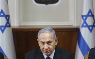 Israeli Prime Minister Benjamin Netanyahu chairs the weekly cabinet meeting at the Prime Minister office in Jerusalem, Sunday, Oct. 28, 2018. (AP Photo/Oded Balilty, Pool)
