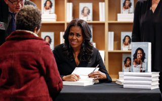 Former first lady Michelle Obama signs copies of her memoir 