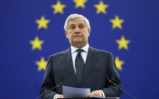 President of the European Parliament Antonio Tajani announces the winner of the Sakharov Prize in Strasbourg, eastern France, Thursday Oct.25, 2018. The European Union has awarded its human rights prize to Oleg Sentsov, a Ukrainian filmmaker imprisoned in Russia accused of plotting acts of terrorism. (AP Photo/Jean-Francois Badias)