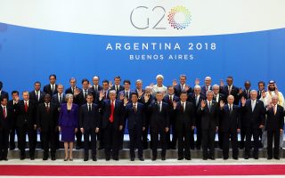 epa07199813 The Heads of State and Government of the G20 countries pose for the family photography of the G20 Summit, at the Costa Salguero convention center, in Buenos Aires, Argentina, 30 November 2018. The G20 Summit brings together the heads of State or Government of the 20 largest economies and takes place from 30 November to 01 December 2018.  EPA/BALLESTEROS