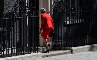 British Prime Minister Theresa May leaves after making a statement, at Downing Street in London, Britain, May 24, 2019. REUTERS/Hannah McKay