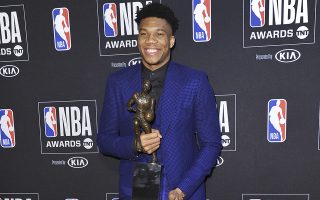 NBA player Giannis Antetokounmpo, of the Milwaukee Bucks, poses in the press room with most valuable player award at the NBA Awards on Monday, June 24, 2019, at the Barker Hangar in Santa Monica, Calif. (Photo by Richard Shotwell/Invision/AP)