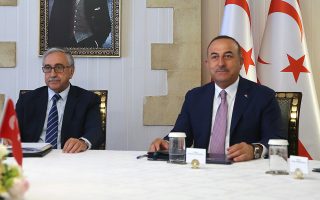 epa07829855 Turkish Foreign Minister Mevlut Cavusoglu (R) speaks with the Turkish Cypriot leader Mustafa Akinci (L) during their meeting in the Turkish Cypriot northern part of the divided city of Nicosia, Cyprus, 09 September 2019. Cyprus has been divided since 1974, when Turkish troops invaded and occupied 37 percent of its territory. Repeated rounds of UN-led peace talks have so far failed to yield results. The latest round of negotiations, in the summer of 2017 at the Swiss resort of Crans-Montana, ended inconclusively.  EPA/KATIA CHRISTODOULOU
