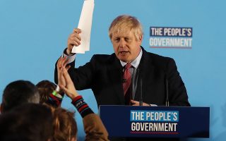 Britain's Prime Minister Boris Johnson gestures after speaking at a campaign event at the Queen Elizabeth II Centre in London, Friday, Dec. 13, 2019. Prime Minister Boris Johnson's Conservative Party has won a solid majority of seats in Britain's Parliament — a decisive outcome to a Brexit-dominated election that should allow Johnson to fulfill his plan to take the U.K. out of the European Union next month. (AP Photo/Frank Augstein)