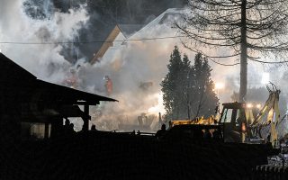 Firefighters work at the site of a building levelled by a gas explosion in Szczyrk, Poland December 4, 2019. Picture taken December 4, 2019. Agencja Gazeta/Grzegorz Celejewski/via REUTERS ATTENTION EDITORS - THIS IMAGE WAS PROVIDED BY A THIRD PARTY. POLAND OUT.