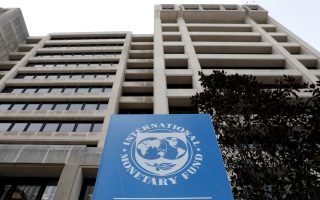 FILE PHOTO: The International Monetary Fund (IMF) headquarters building is seen in Washington, U.S., April 8, 2019. REUTERS/Yuri Gripas/File Photo